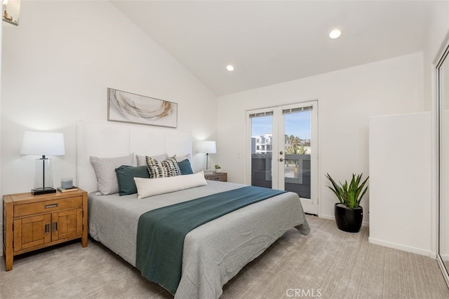 bedroom featuring vaulted ceiling, light colored carpet, access to exterior, and french doors