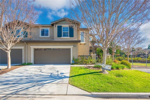 craftsman-style home with a garage and a front yard