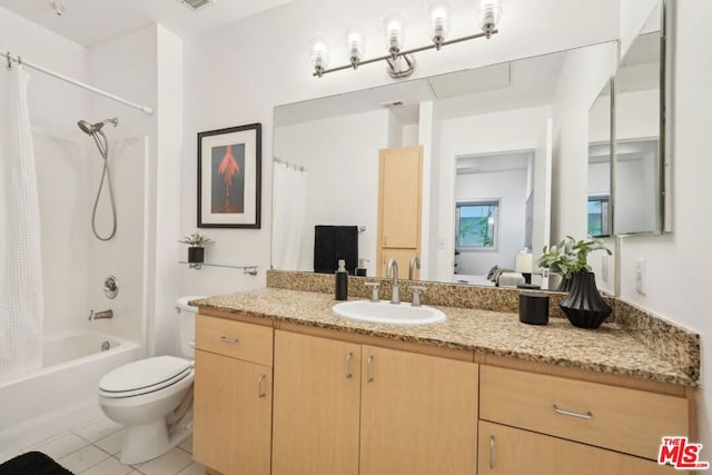 full bathroom featuring tile patterned floors, toilet, shower / tub combo, and vanity