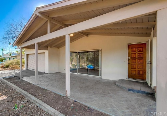 view of patio with a garage