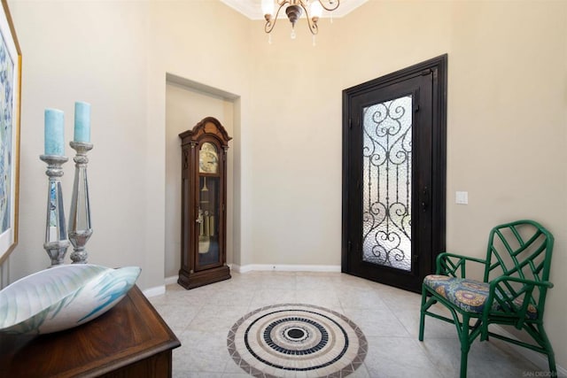 entryway featuring light tile patterned flooring and a chandelier