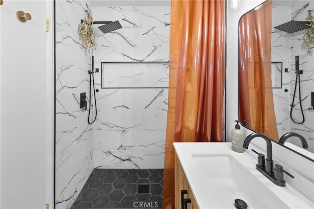 bathroom with vanity and curtained shower