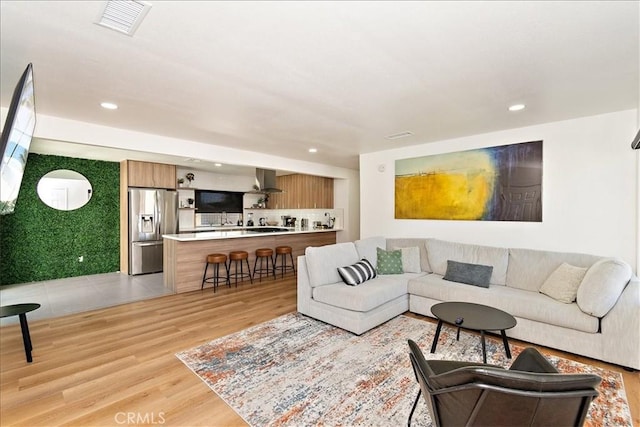 living room featuring light hardwood / wood-style flooring