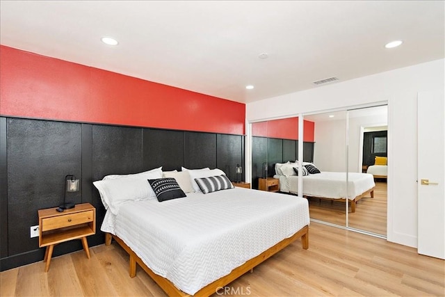 bedroom featuring wood-type flooring