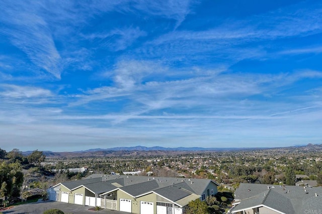 drone / aerial view featuring a mountain view