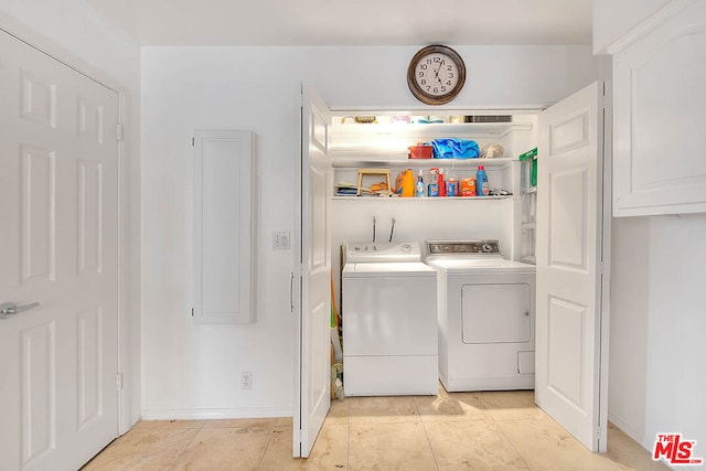 laundry area with separate washer and dryer