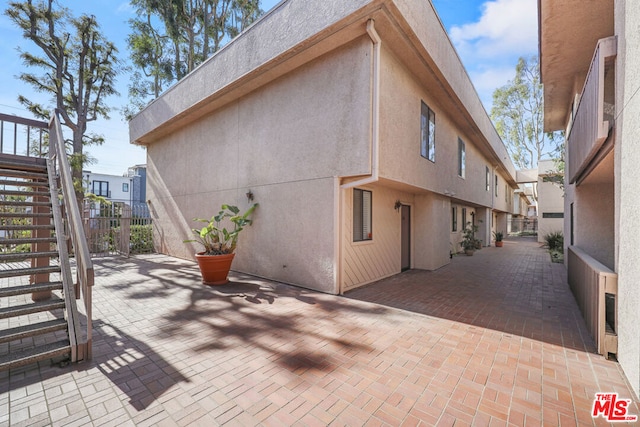 view of home's exterior with a patio