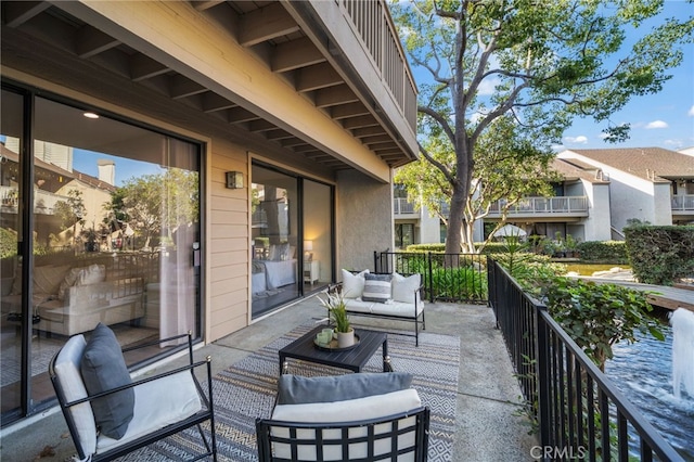 view of patio / terrace featuring a balcony and an outdoor hangout area