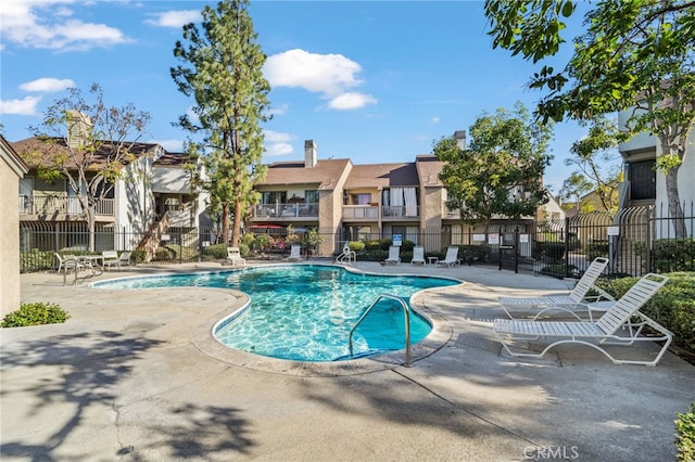 view of pool featuring a patio