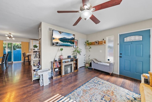 foyer with dark hardwood / wood-style floors and ceiling fan