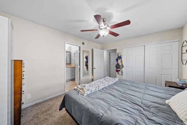 bedroom with light carpet, connected bathroom, a closet, and ceiling fan