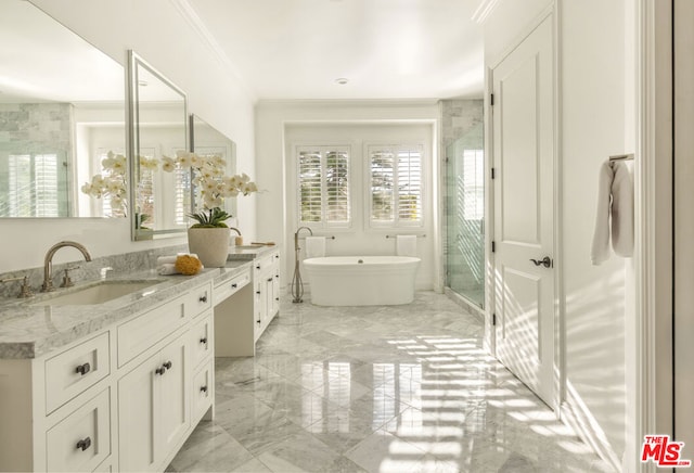 bathroom featuring ornamental molding, separate shower and tub, and vanity