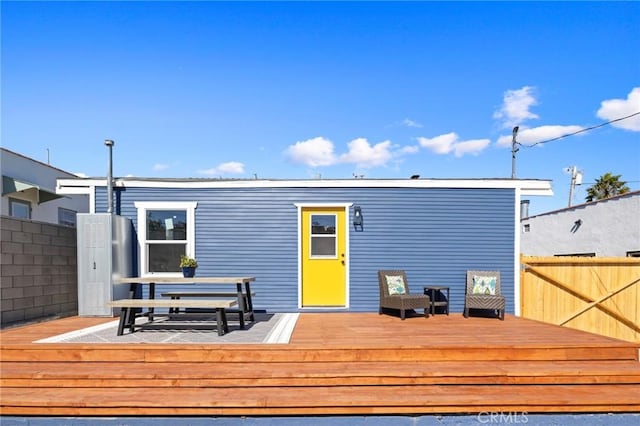 rear view of house with a deck