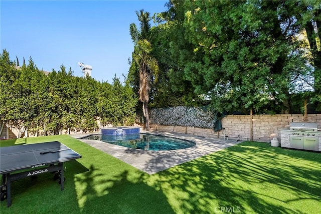 view of pool with an in ground hot tub, area for grilling, and a yard