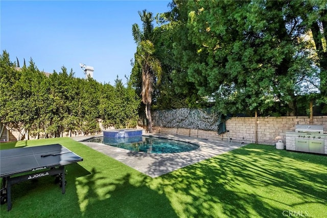 view of pool featuring a yard, an in ground hot tub, and grilling area