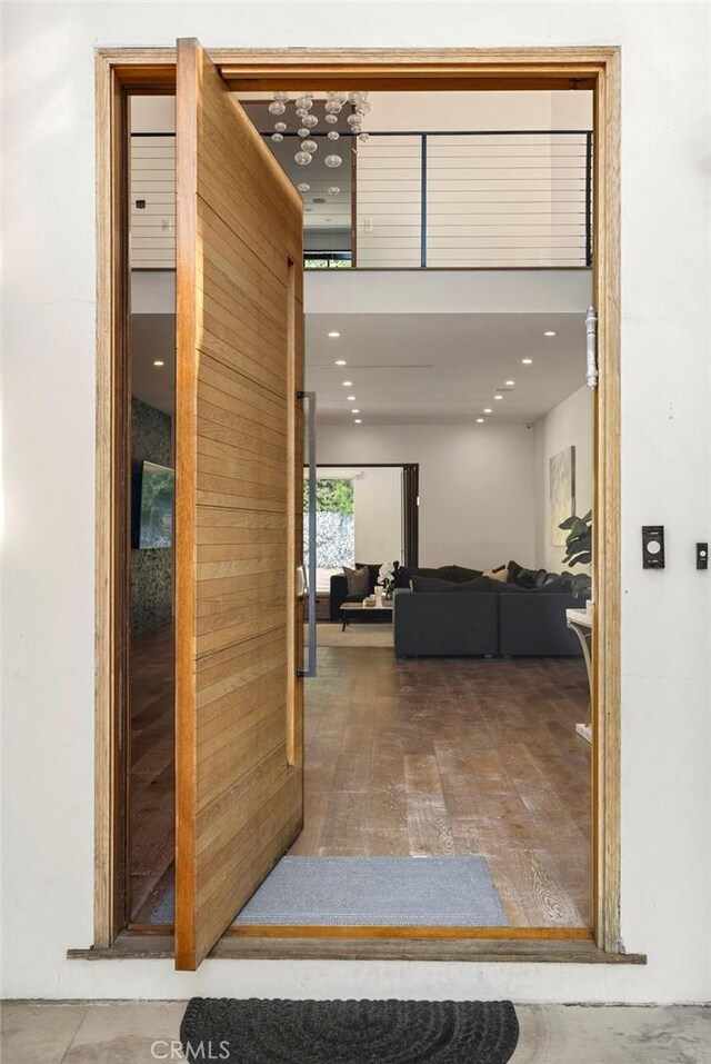 hallway featuring hardwood / wood-style floors