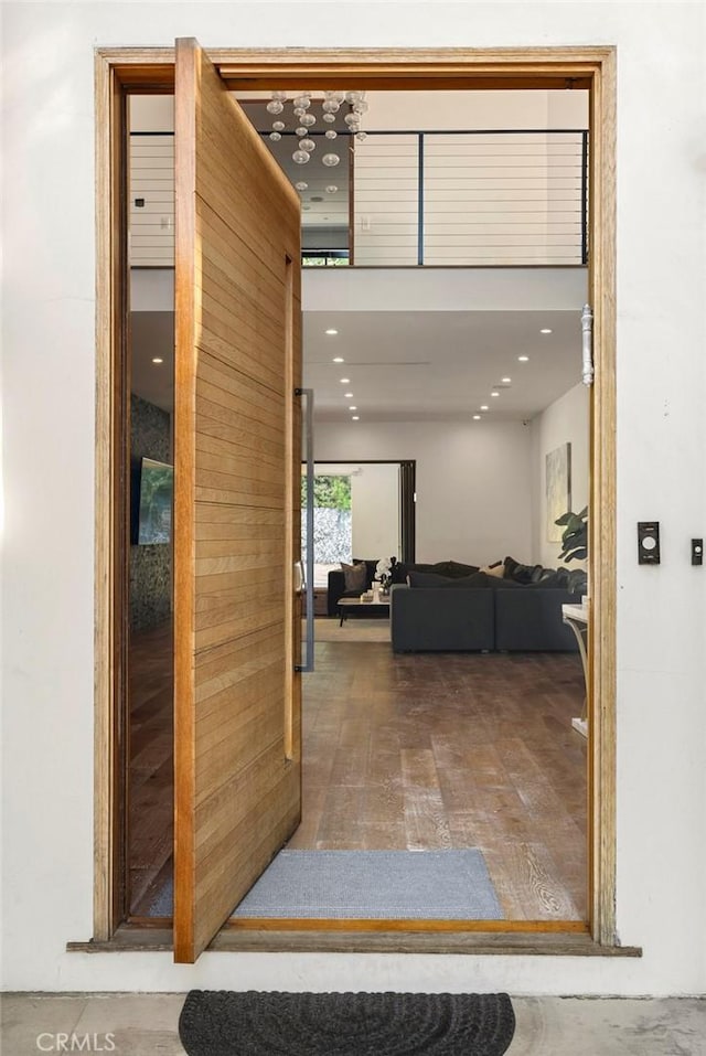 hall featuring wood-type flooring