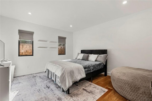 bedroom featuring wood-type flooring