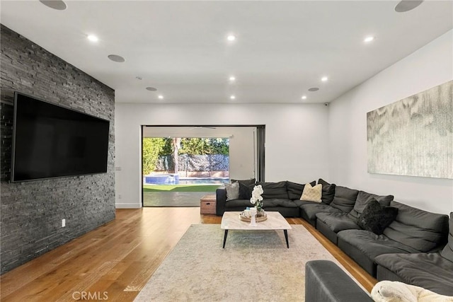 living room with light hardwood / wood-style floors