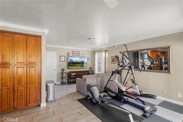 workout area with ornamental molding