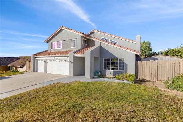 view of front of house featuring a garage and a front yard