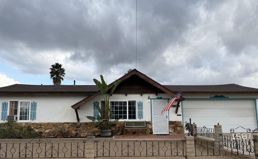 ranch-style house featuring a garage