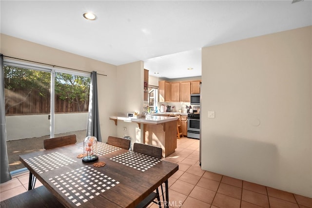 dining room with light tile patterned floors