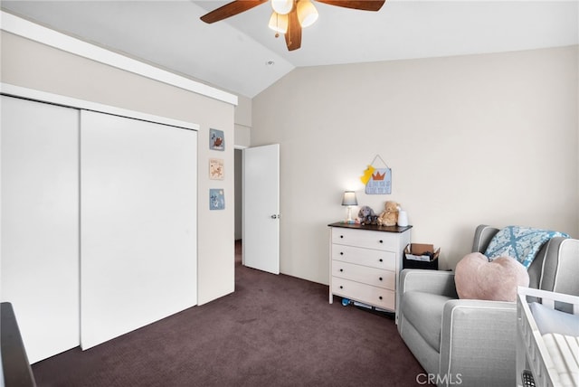 living area with ceiling fan, lofted ceiling, and dark carpet