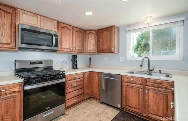 kitchen featuring stainless steel appliances and sink