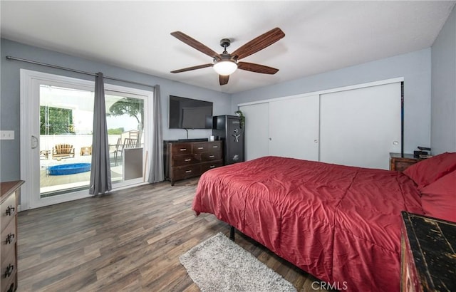 bedroom featuring access to exterior, a closet, dark hardwood / wood-style floors, and ceiling fan