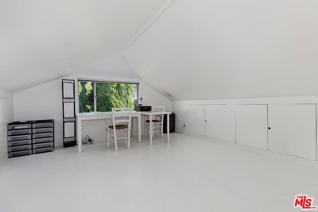 bonus room with vaulted ceiling