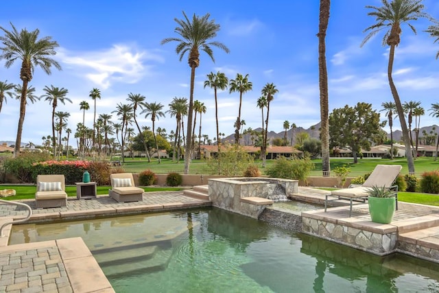 view of pool featuring a patio