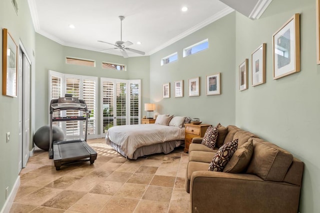 bedroom with crown molding, a towering ceiling, access to outside, and ceiling fan