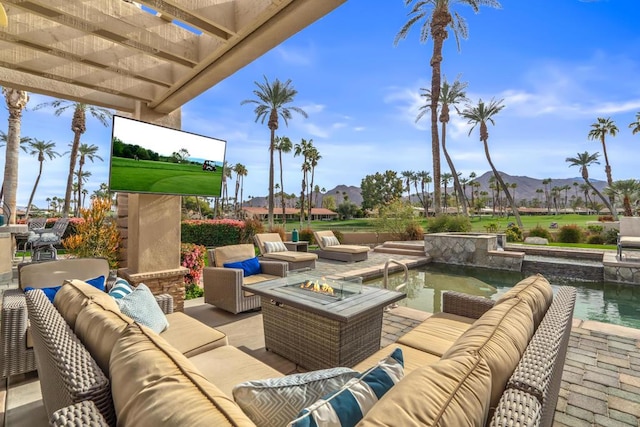 view of patio with a pergola, an outdoor living space with a fire pit, and a water view