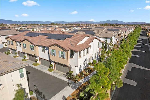 drone / aerial view featuring a mountain view