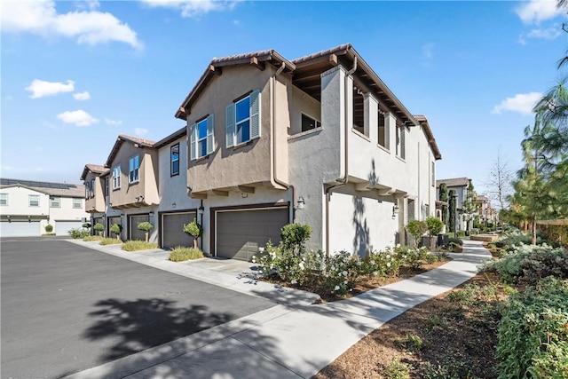 exterior space with a garage