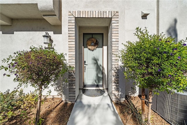 entrance to property featuring central AC unit