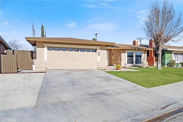 single story home with a garage and a front yard