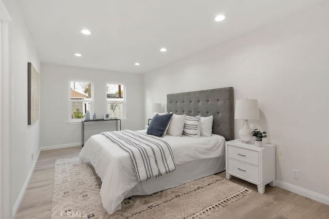 bedroom featuring light hardwood / wood-style floors