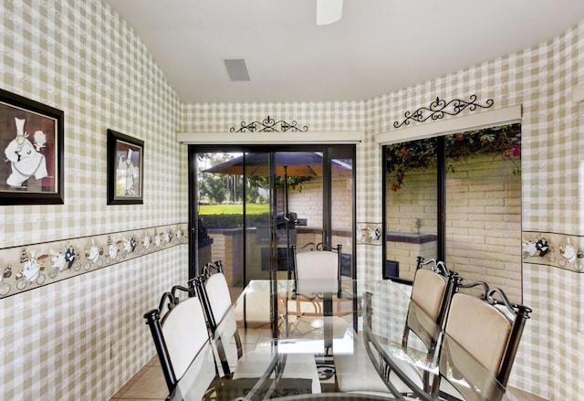 dining area featuring tile patterned floors