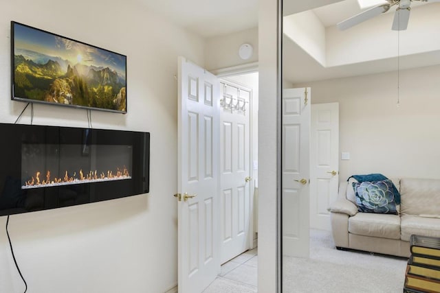 interior space featuring ceiling fan