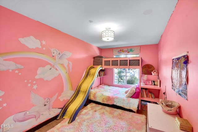 bedroom with wood-type flooring