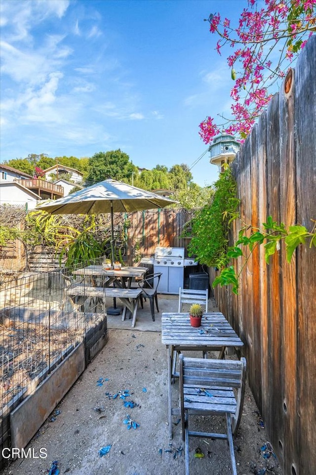 view of patio with area for grilling