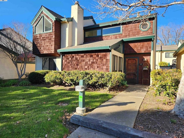 view of front of house with a front lawn