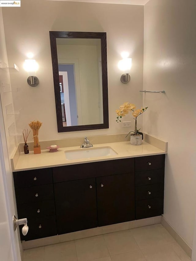 bathroom with vanity and tile patterned floors