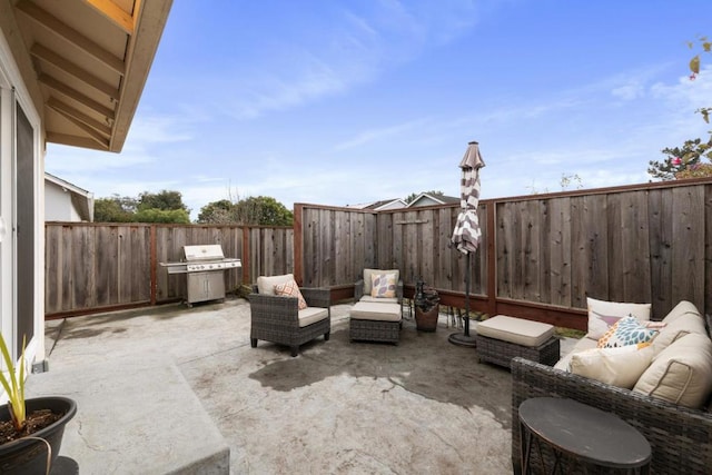 view of patio / terrace with a grill and an outdoor living space