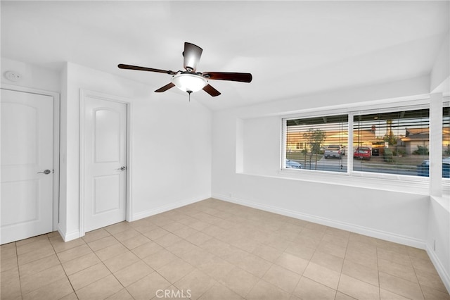 unfurnished room featuring ceiling fan