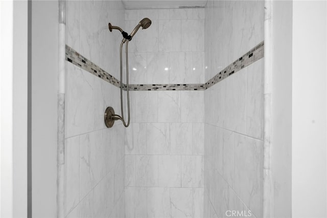 details featuring a tile shower