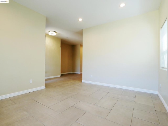 view of tiled spare room