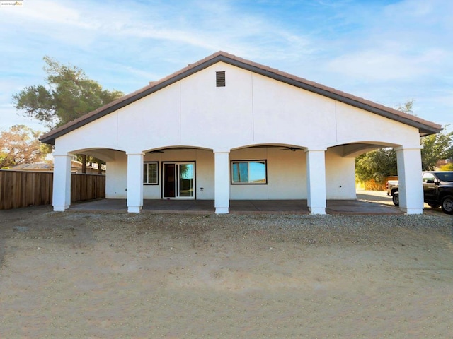 rear view of house with a porch